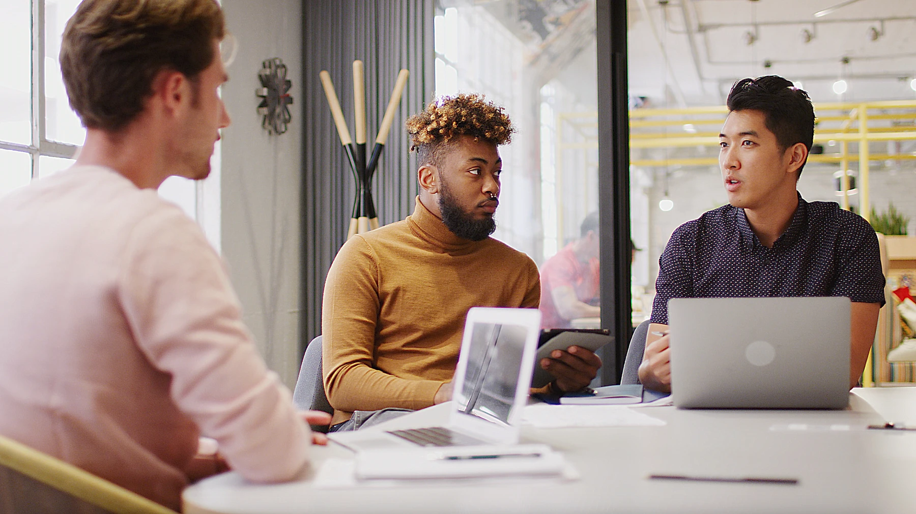 Team planning digital marketing campaign to increase brand awareness and customer engagement