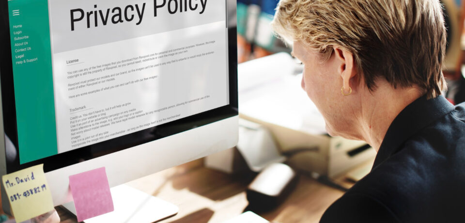 Offline Brand Identity visuals created by Social Feenix, including physical brand assets placed beside digital screens.